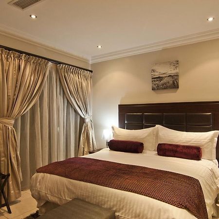 L'Eola Suites Abuja Phòng bức ảnh