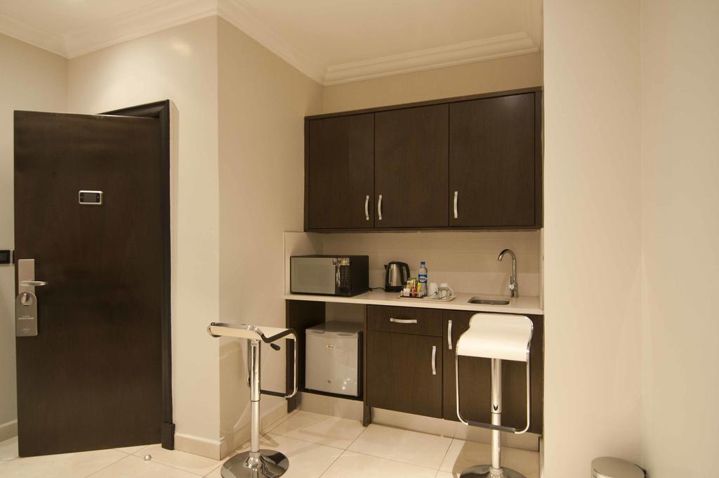 L'Eola Suites Abuja Phòng bức ảnh